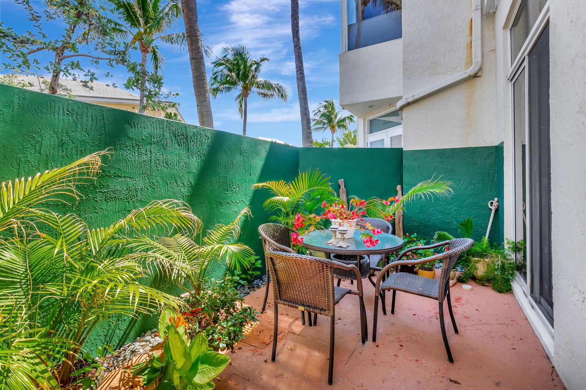 2115 South Ocean Boulevard, Unit 14 Delray Beach, FL 33483 - Photo 24 of 56 a outdoor dining space with furniture