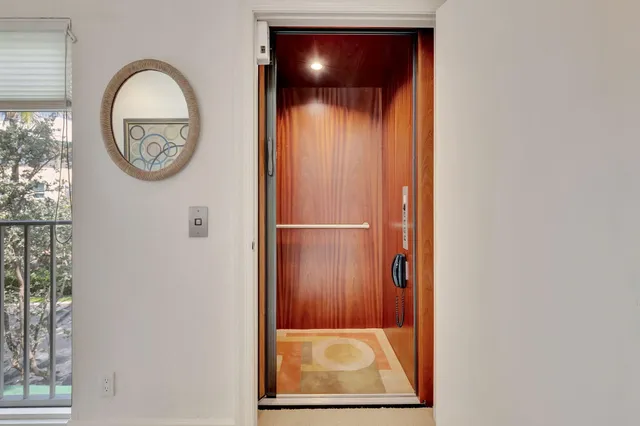 a bedroom with a bed and furniture