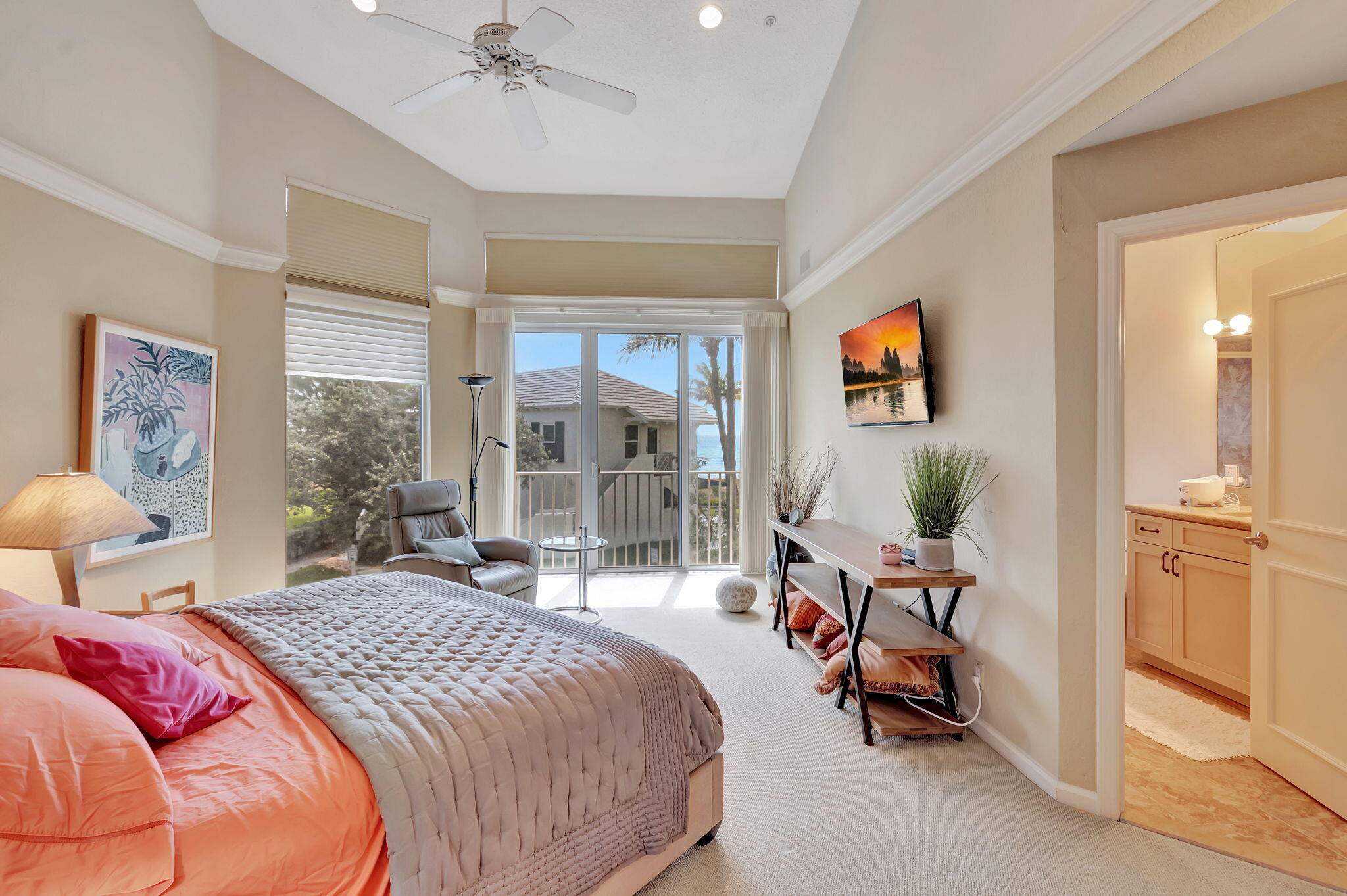 2115 South Ocean Boulevard, Unit 14 Delray Beach, FL 33483 - Photo 29 of 56 a bedroom with a bed and furniture