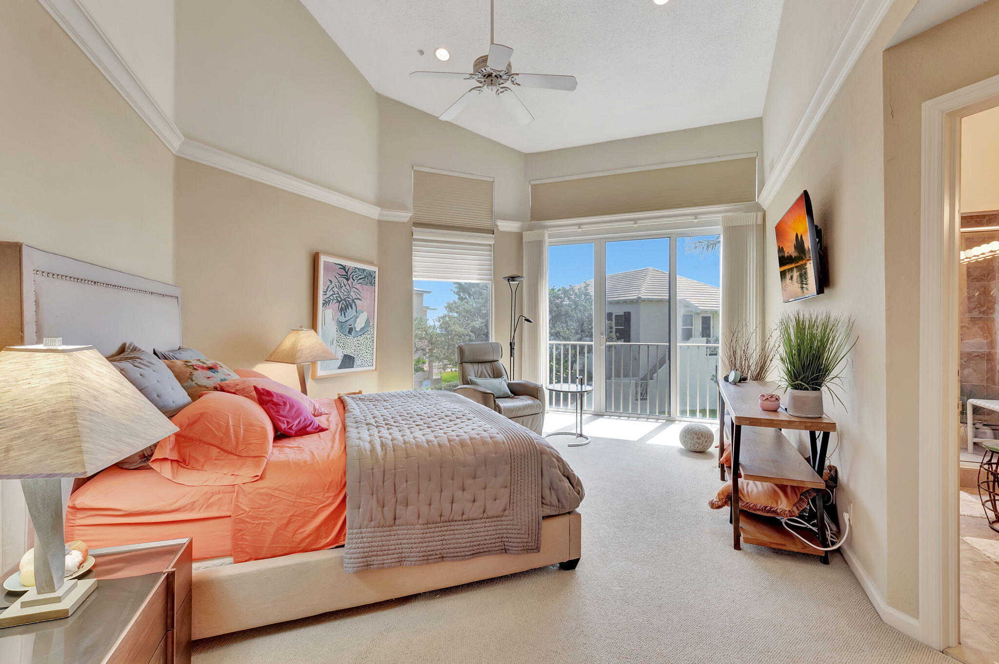 2115 South Ocean Boulevard, Unit 14 Delray Beach, FL 33483 - Photo 30 of 56 a bedroom with a bed and a large window