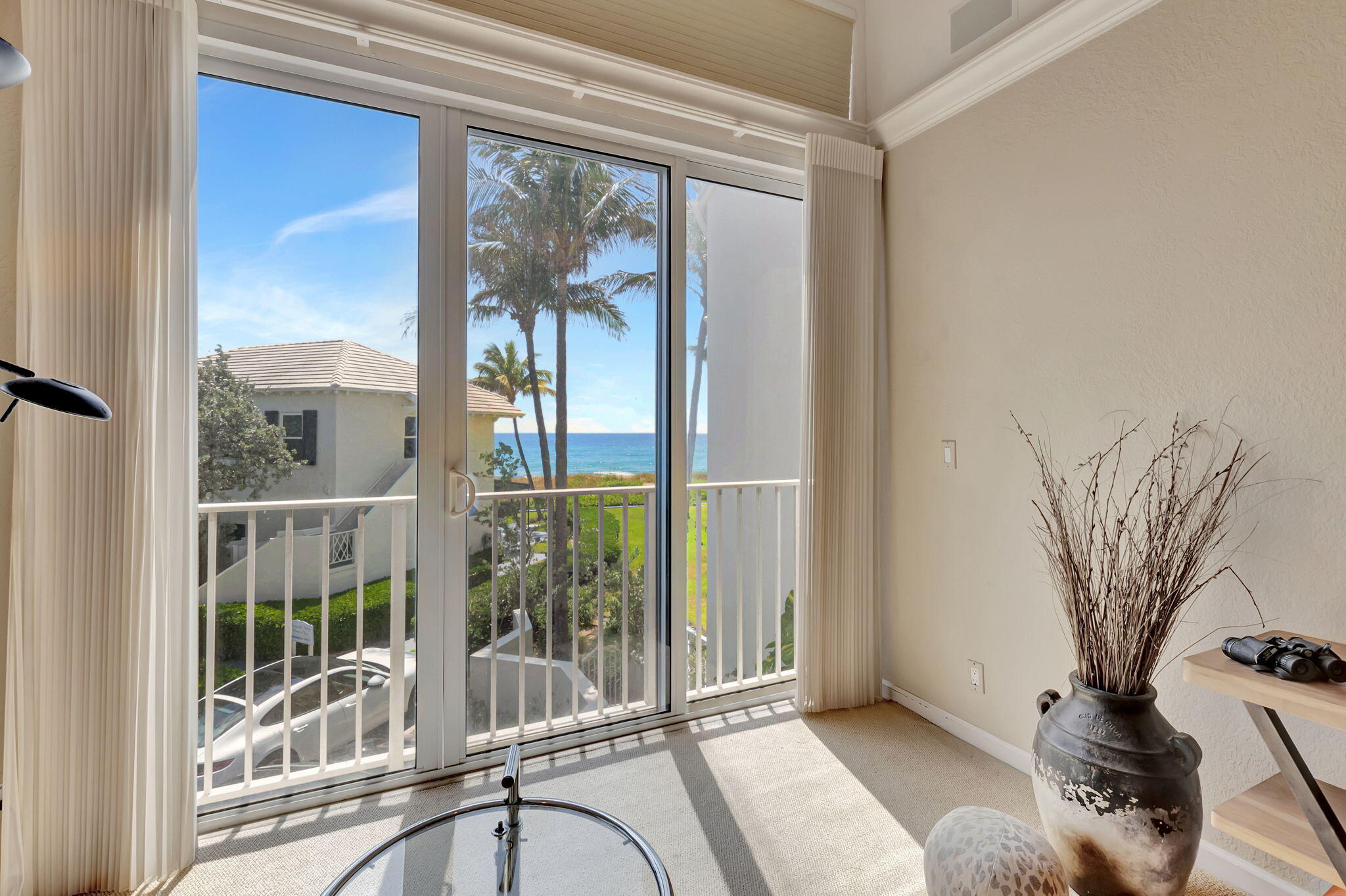 2115 South Ocean Boulevard, Unit 14 Delray Beach, FL 33483 - Photo 31 of 56 a view of a room with a large window and front door