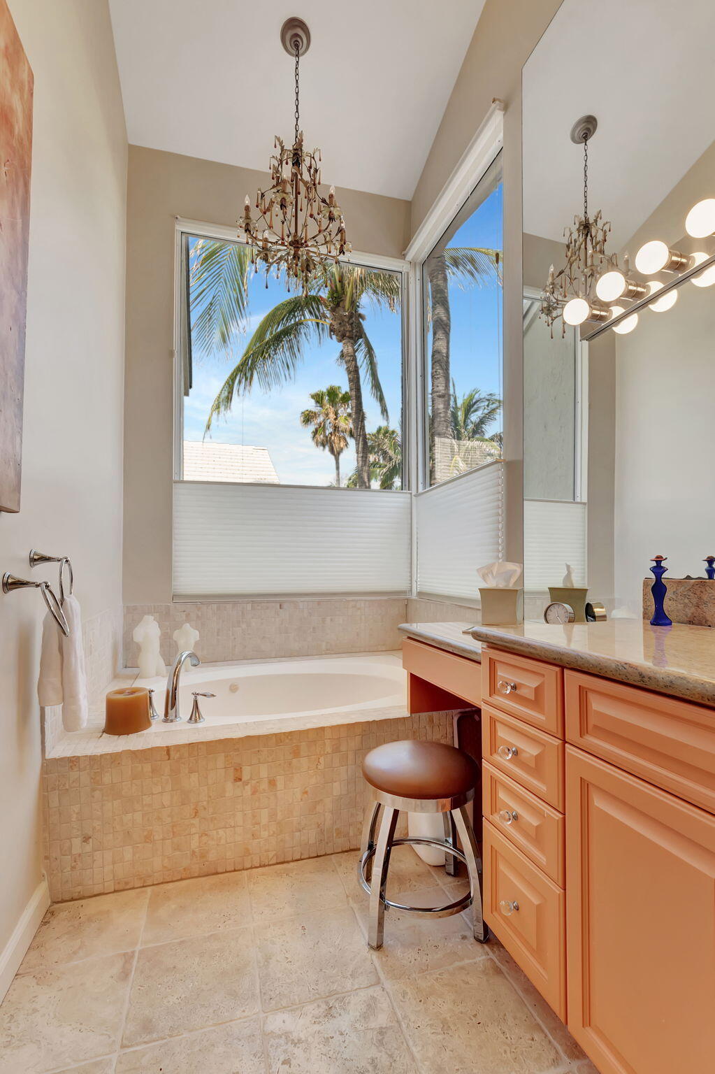 2115 South Ocean Boulevard, Unit 14 Delray Beach, FL 33483 - Photo 33 of 56 a spacious bathroom with a double vanity sink a mirror a bathtub and a window