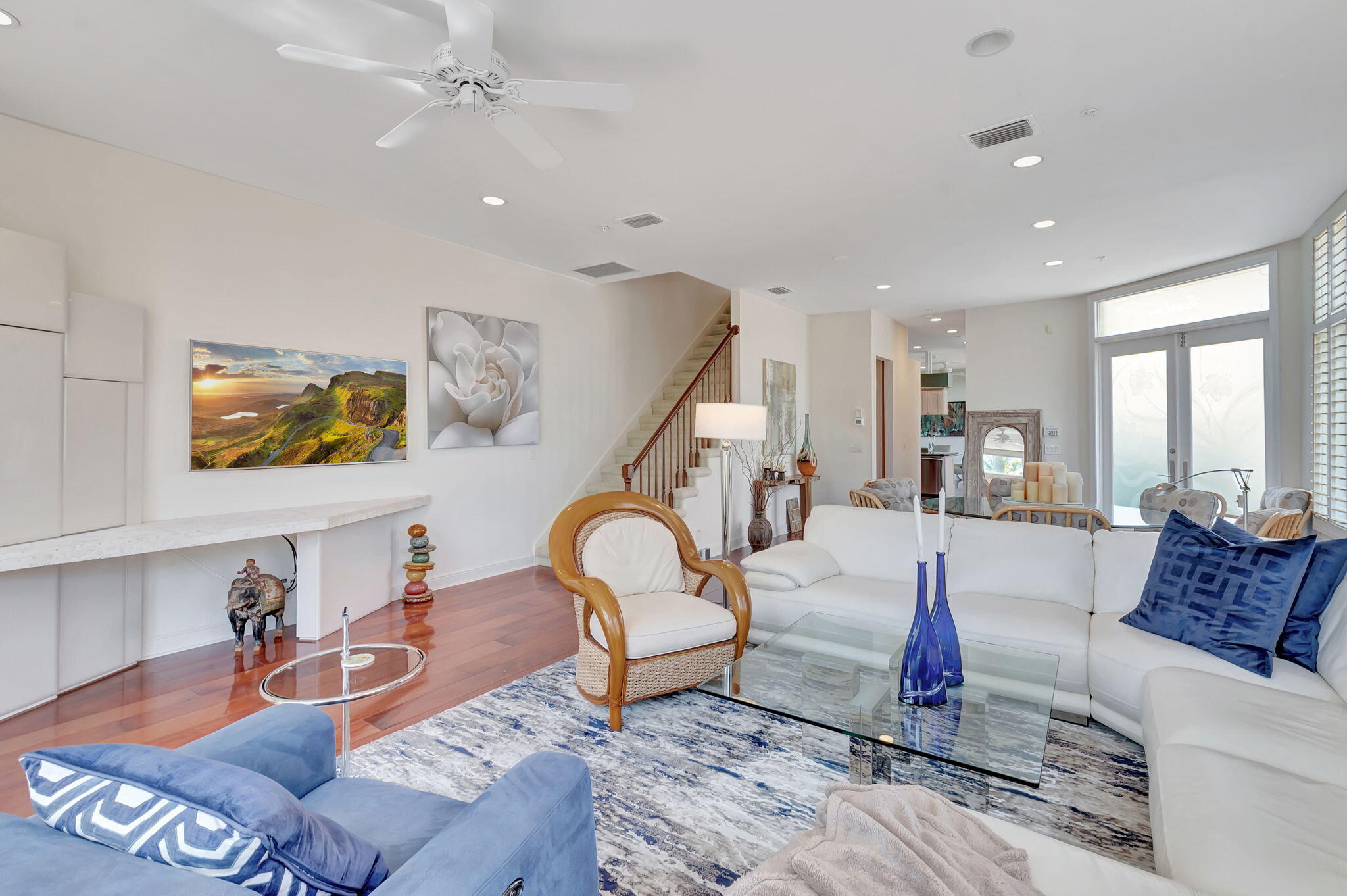 2115 South Ocean Boulevard, Unit 14 Delray Beach, FL 33483 - Photo 7 of 56 a living room with furniture and wooden floor