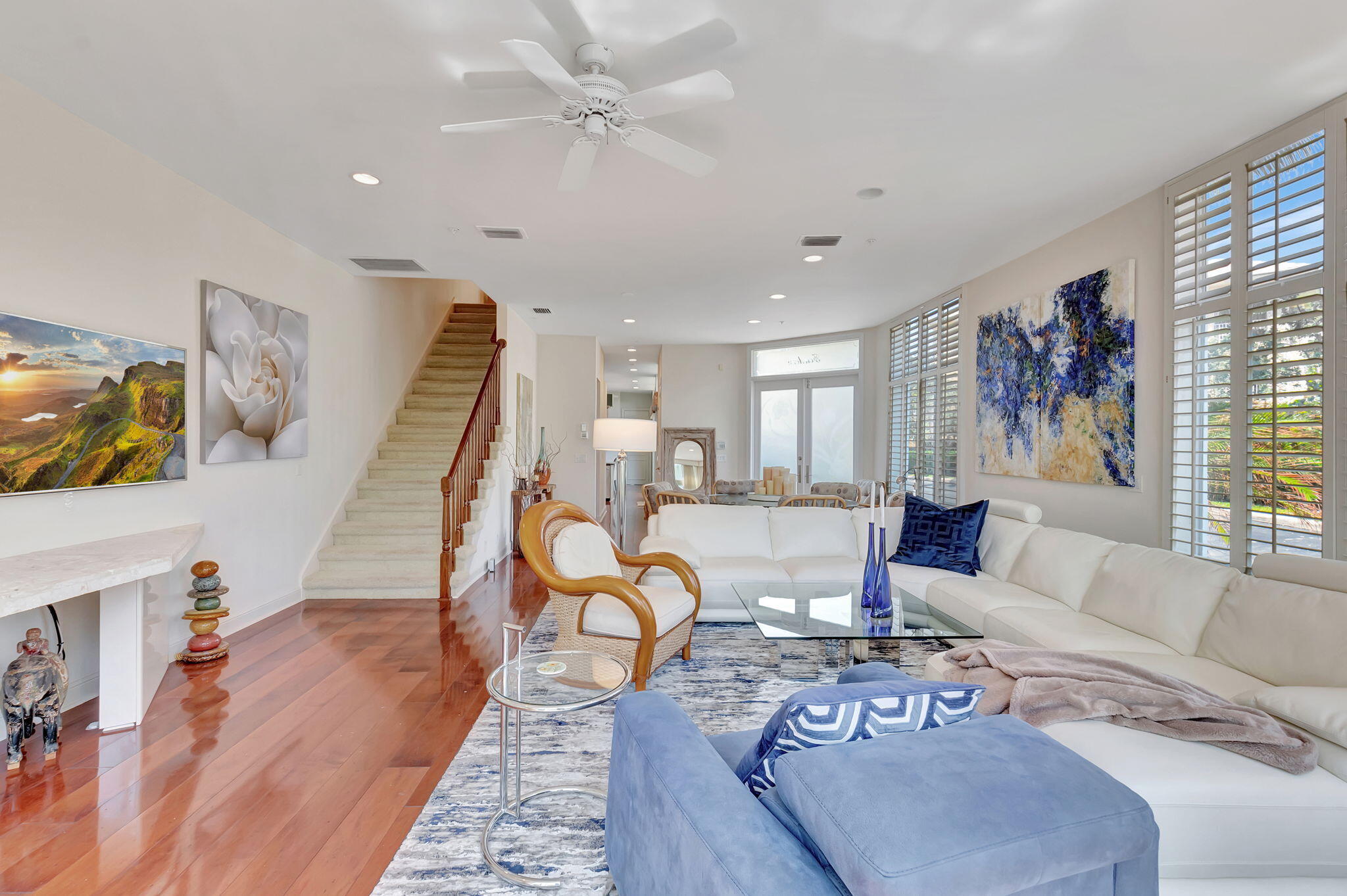 2115 South Ocean Boulevard, Unit 14 Delray Beach, FL 33483 - Photo 8 of 56 a living room with furniture and wooden floor