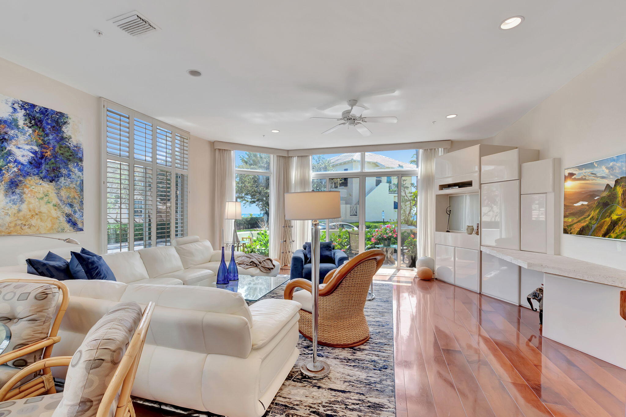 2115 South Ocean Boulevard, Unit 14 Delray Beach, FL 33483 - Photo 9 of 56 a living room with furniture and a flat screen tv
