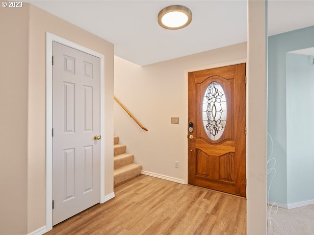 2488 Pheasant Ridge Street Umatilla, OR 97882 - Photo 4 of 40 an empty room with wooden floor and closet