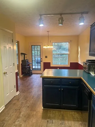 a kitchen with a stove and a sink