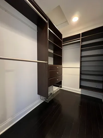 a view of an empty walk in closet