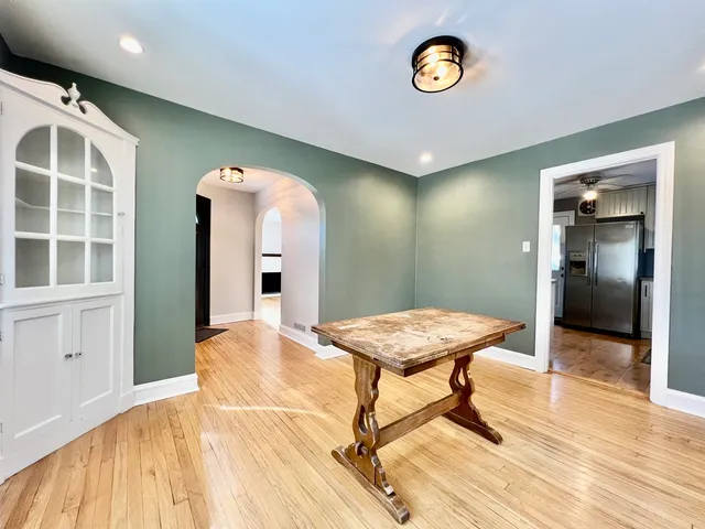 a view of a room with a table and chair