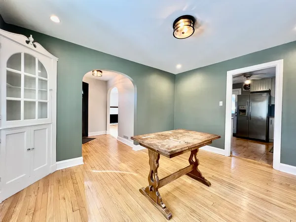 a view of a room with a table and chair