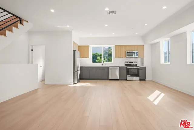 a view of kitchen and microwave