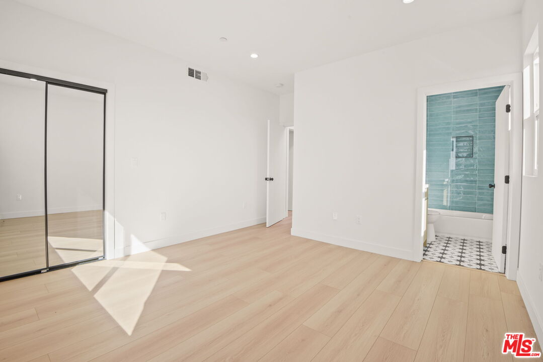 1707 South Burnside Avenue, Unit 1/2 Los Angeles, CA 90019 - Photo 21 of 30 a view of an empty room with a window