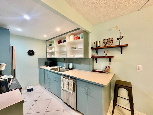 2070 Cornwall East Boca Raton, FL 33434 - Photo 8 of 30 a kitchen with a sink cabinets and window