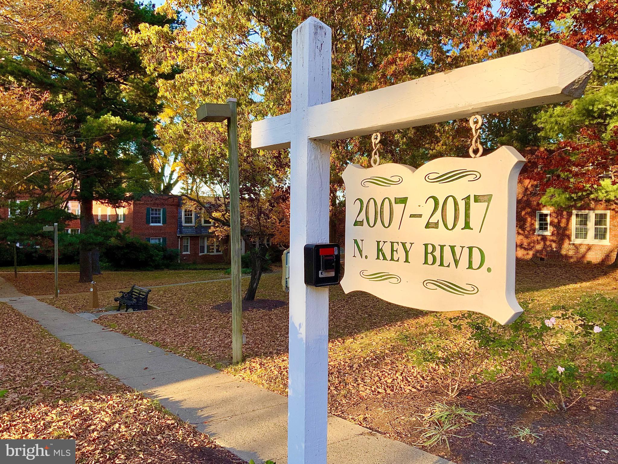 2007 Key Boulevard, Unit 589 Arlington, VA 22201 - Photo 3 of 16 a street sign on a sidewalk next to a road