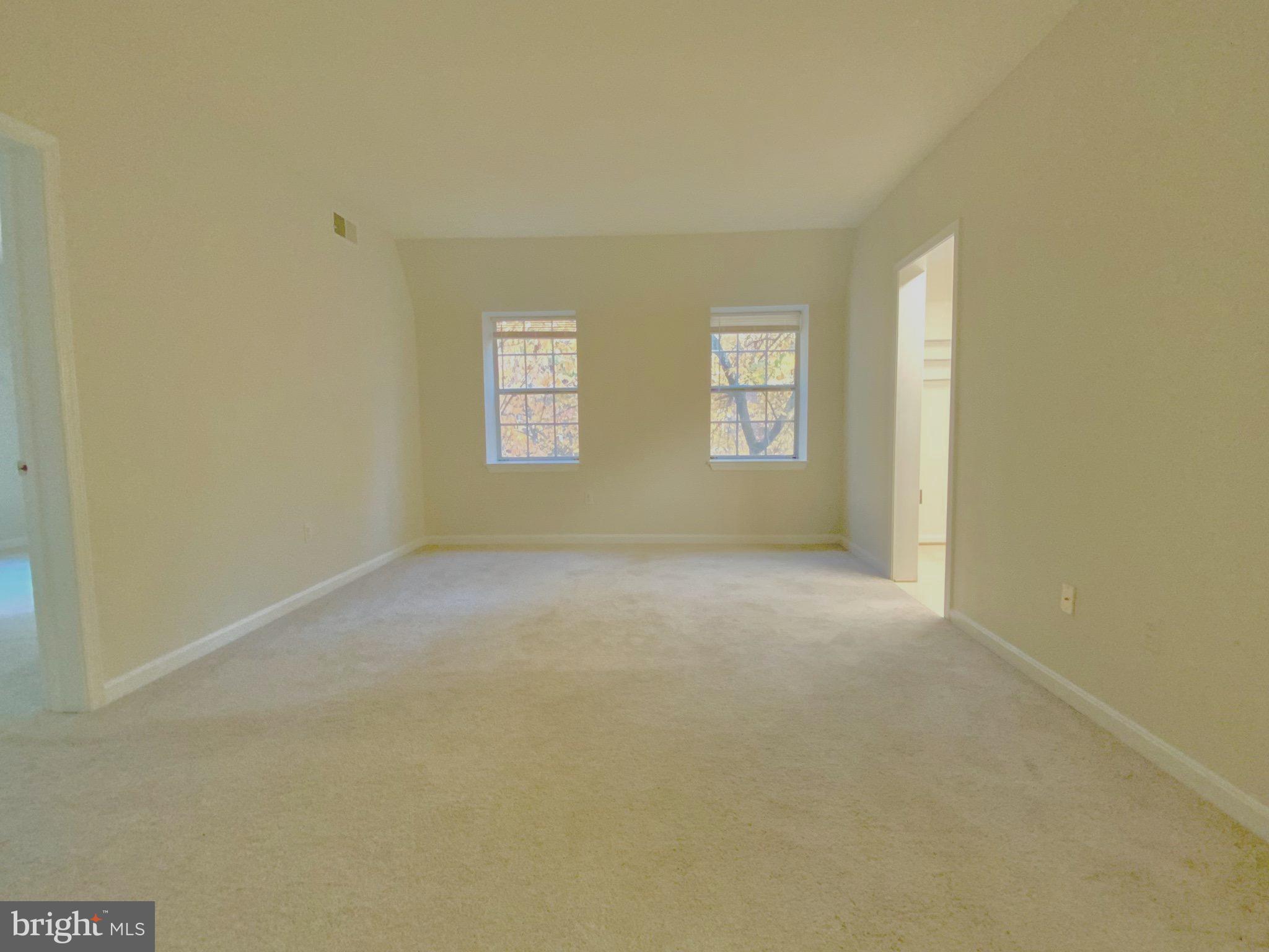 2007 Key Boulevard, Unit 589 Arlington, VA 22201 - Photo 4 of 16 a view of an empty room with a window