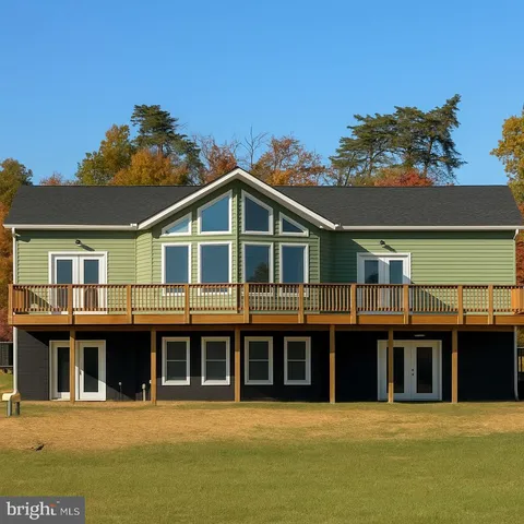 a view of a large building with a large pool and a yard