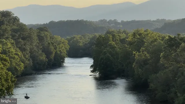 a view of a lake with a mountain