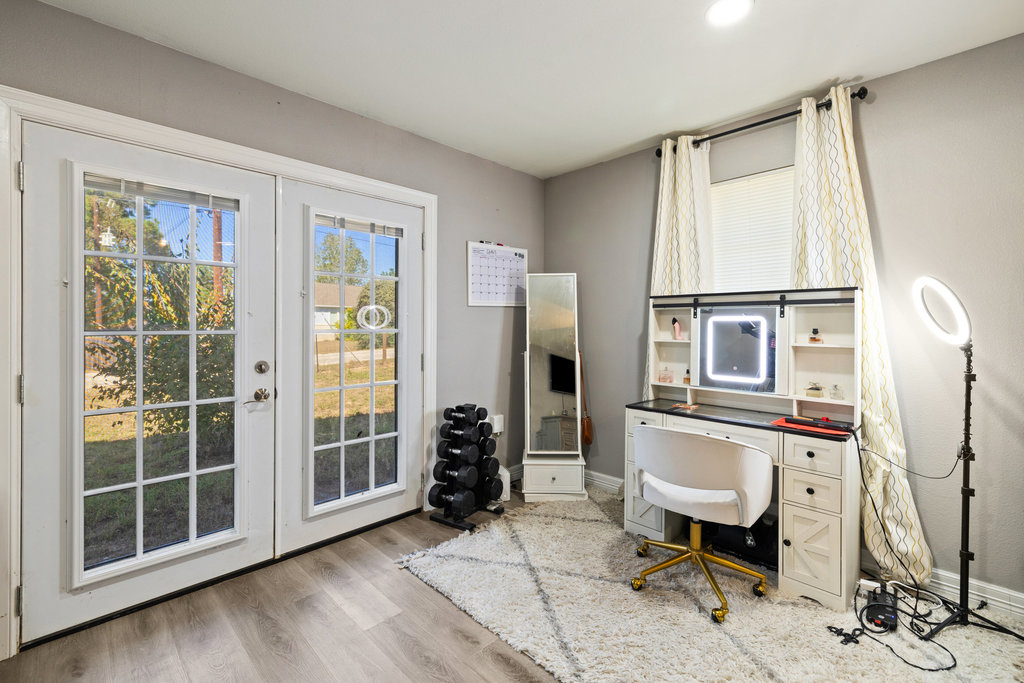 115 Rangeland Road Bastrop, TX 78602 - Photo 21 of 40 a view of a livingroom with furniture and windows