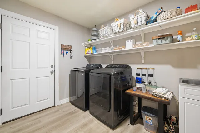 a utility room with dryer and washer