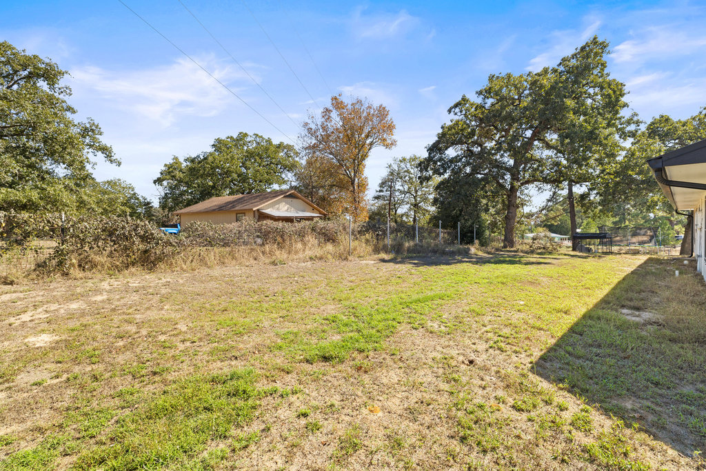 115 Rangeland Road Bastrop, TX 78602 - Photo 37 of 40 a view of swimming pool with an outdoor space