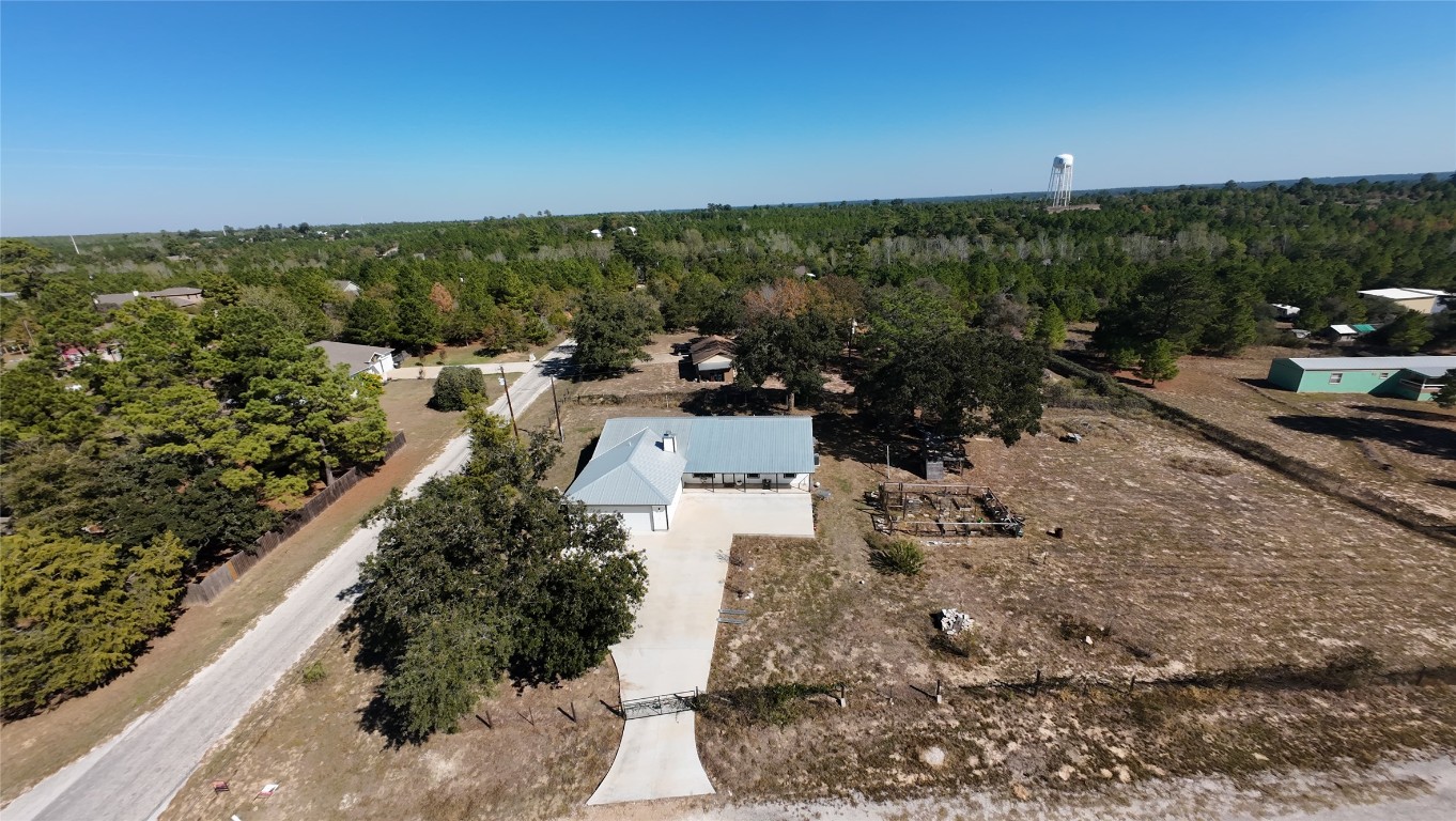 115 Rangeland Road Bastrop, TX 78602 - Photo 39 of 40 an aerial view of a house with a yard