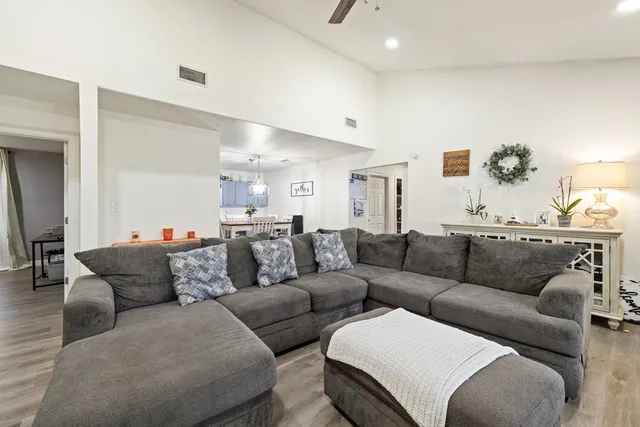 a living room with furniture and a couch