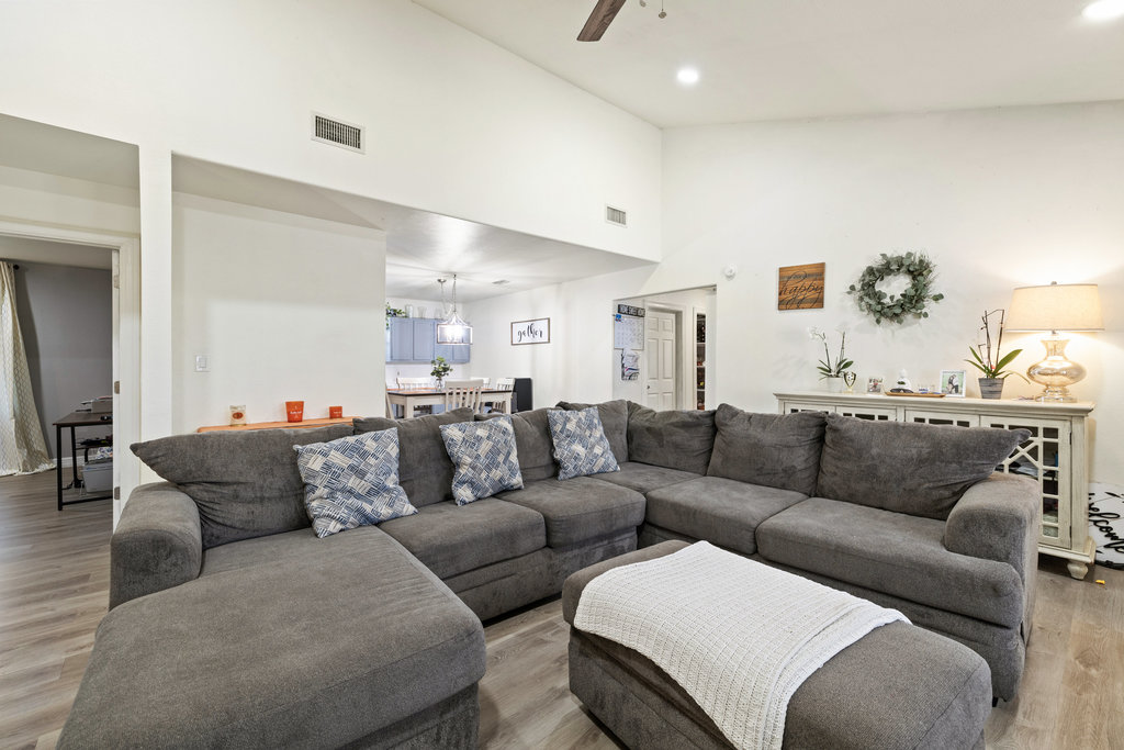 115 Rangeland Road Bastrop, TX 78602 - Photo 8 of 40 a living room with furniture and a couch