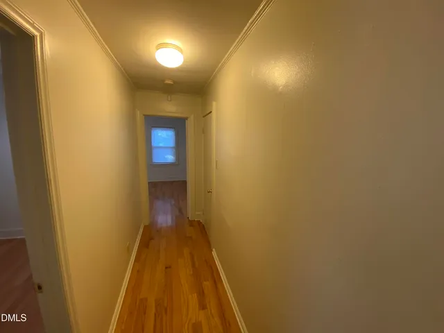 a bathroom with a granite countertop toilet sink and shower