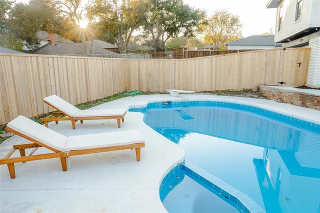 a view of a chairs and tables in the patio