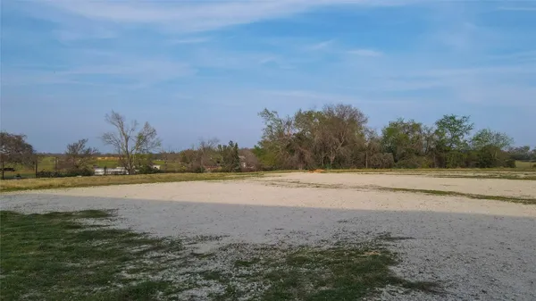 a view of an ocean beach and mountain