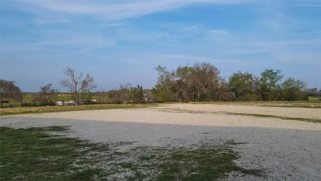 a view of an ocean beach and mountain