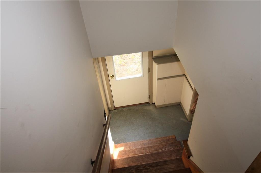 1452 Northfield Road Machias, ME 04654 - Photo 26 of 30 Stairs down towards the washer/dryer...