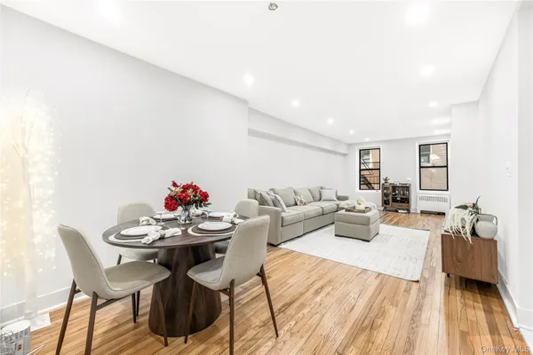 a living room with furniture and a table