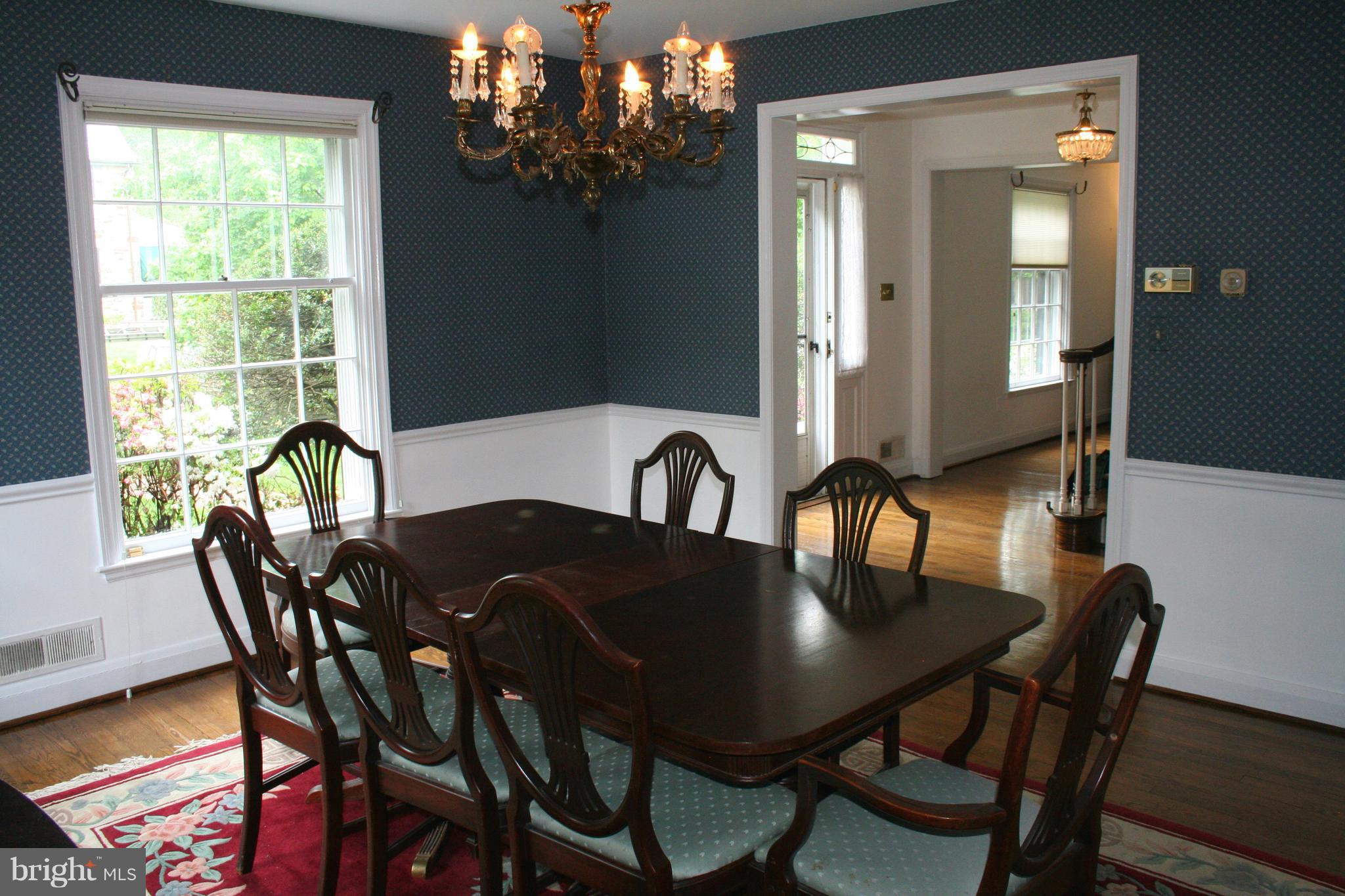 115 Enfield Road Baltimore, MD 21212 - Photo 12 of 37 Dining Room opens to foyer & kitchen