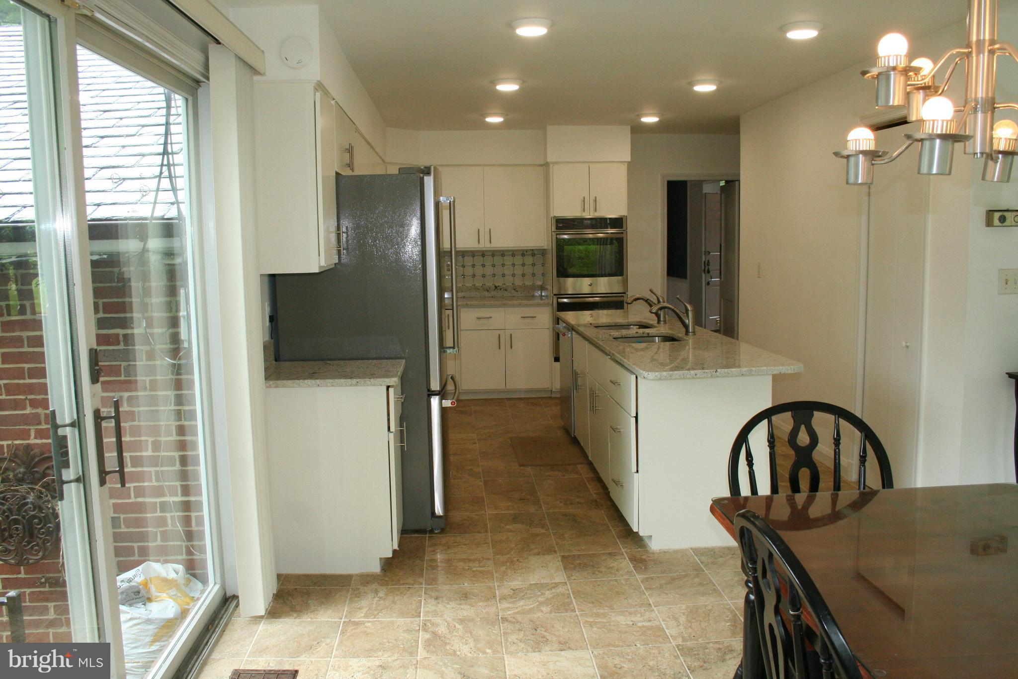115 Enfield Road Baltimore, MD 21212 - Photo 14 of 37 Bright white Kitchen