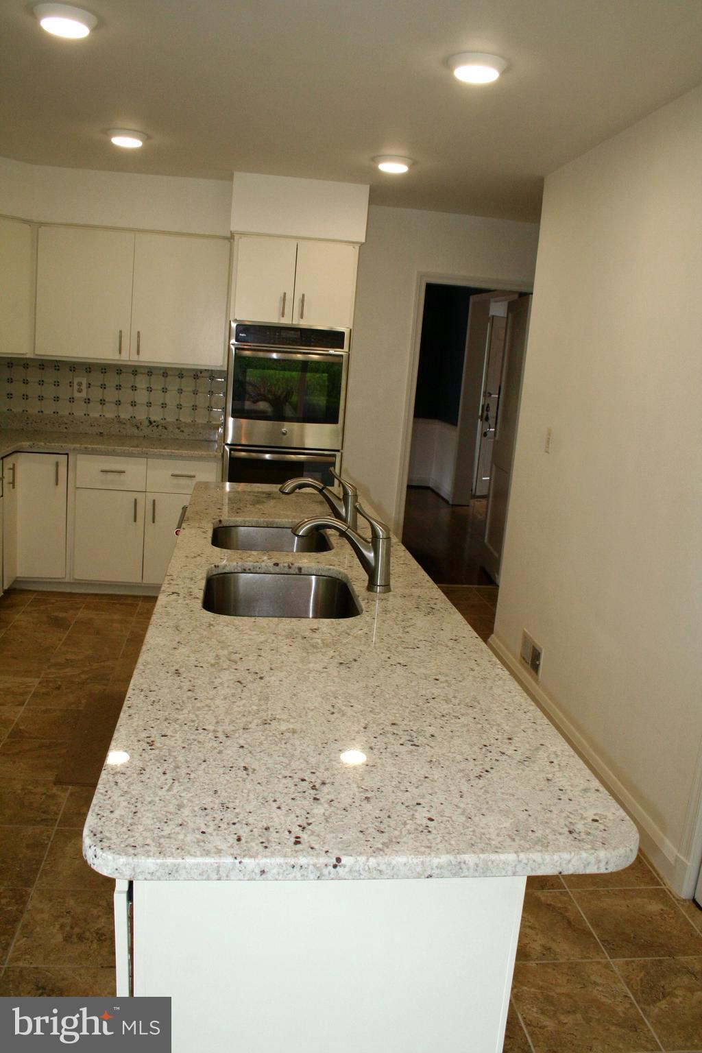 115 Enfield Road Baltimore, MD 21212 - Photo 16 of 37 Island includes double sink