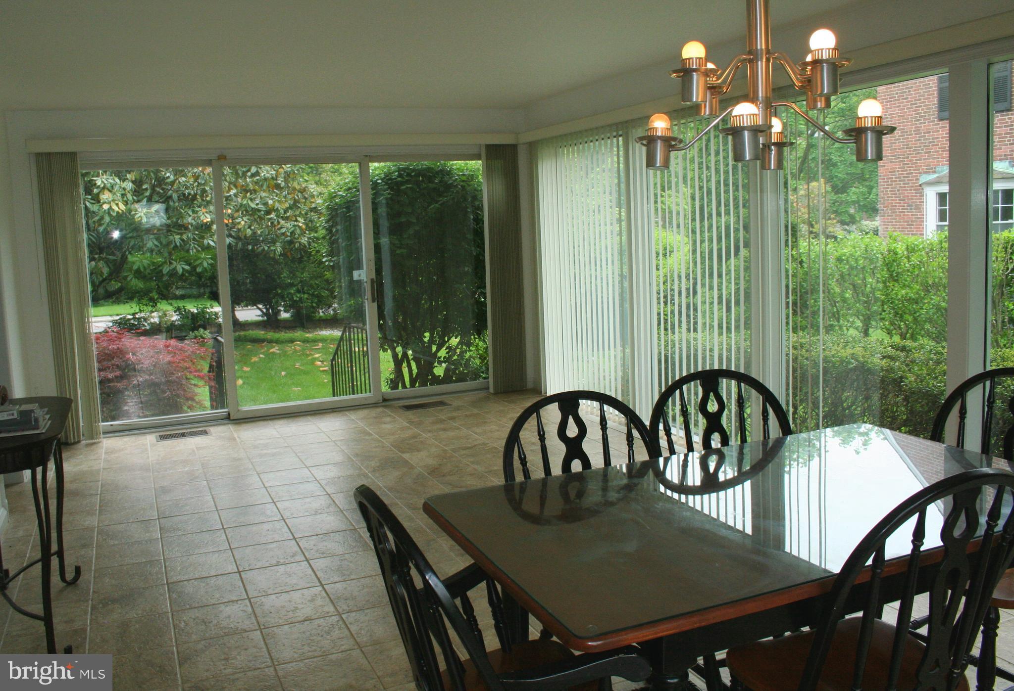 115 Enfield Road Baltimore, MD 21212 - Photo 18 of 37 Sunshiny Sunroom off the Kitchen