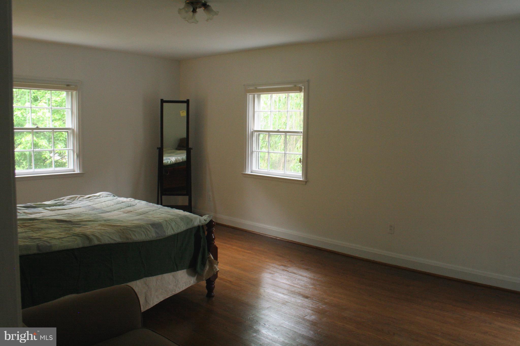 115 Enfield Road Baltimore, MD 21212 - Photo 21 of 37 Master Bedroom overlooks front & side gardens
