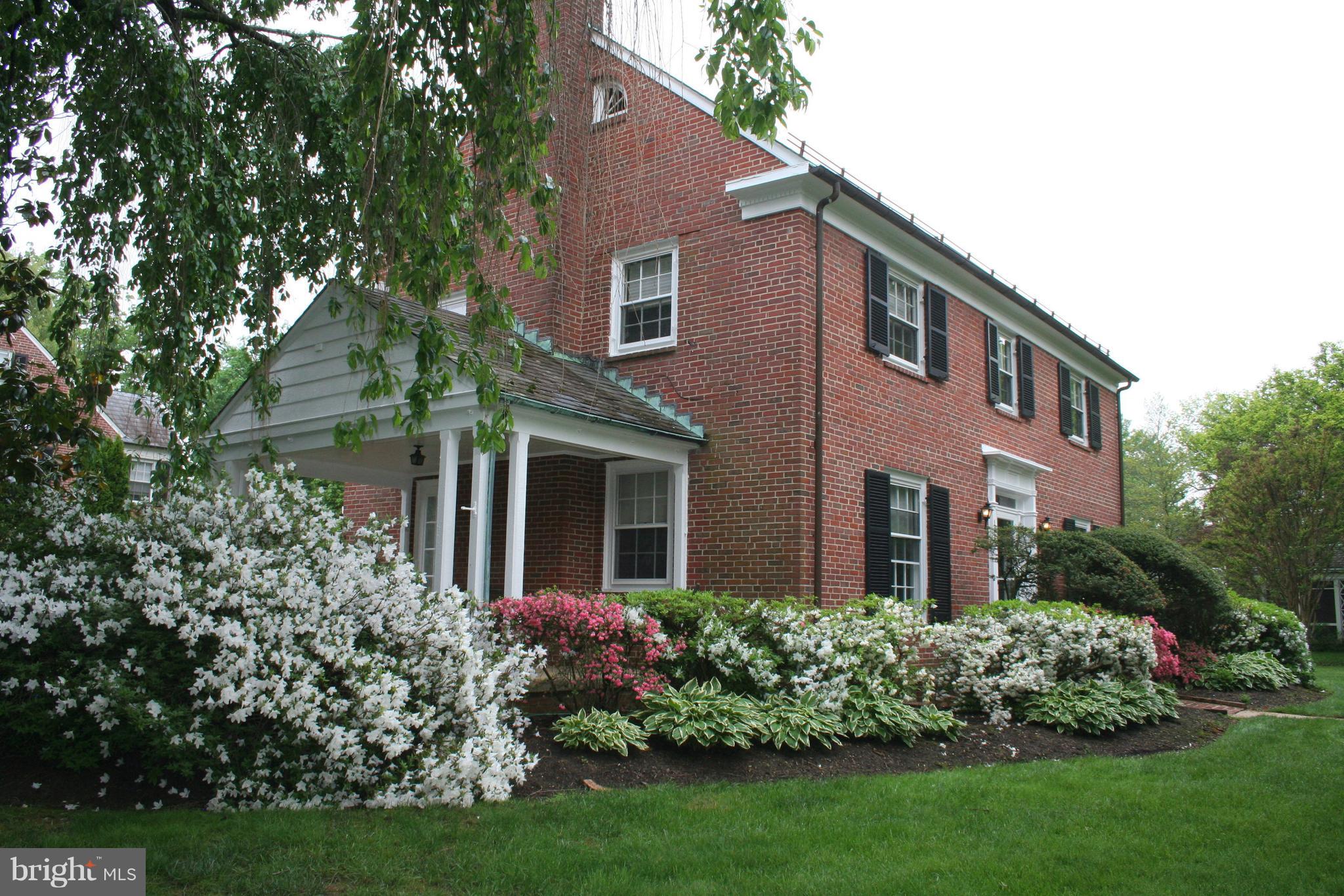 115 Enfield Road Baltimore, MD 21212 - Photo 4 of 37 Smell spring flowers on your side porch