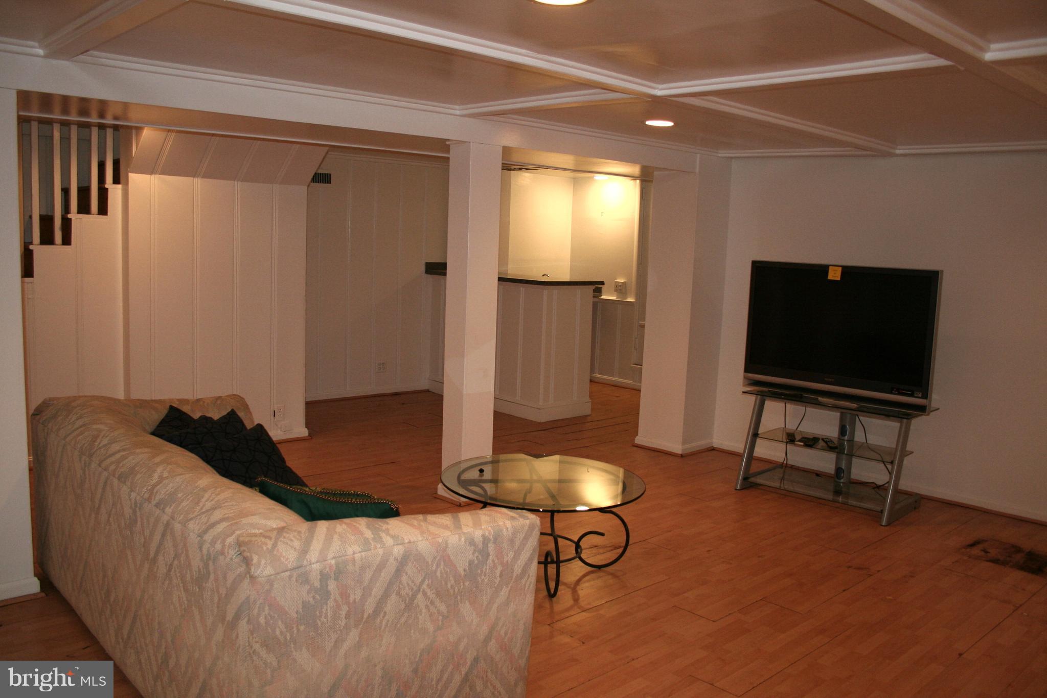 115 Enfield Road Baltimore, MD 21212 - Photo 32 of 37 Lower level also includes wet bar & wine room