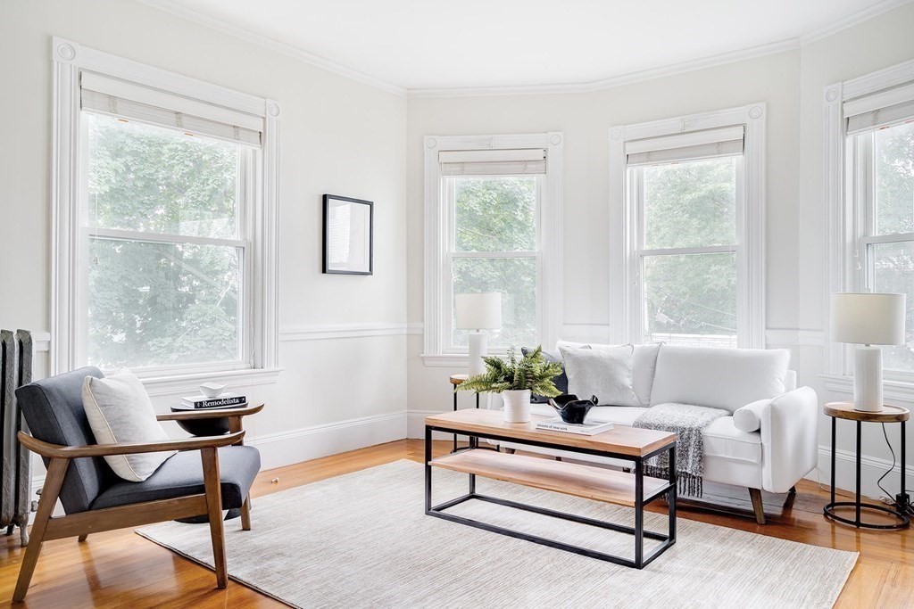30 Stanton Road, Unit 3 Brookline, MA 02445 - Photo 3 of 13 a living room with furniture and a window