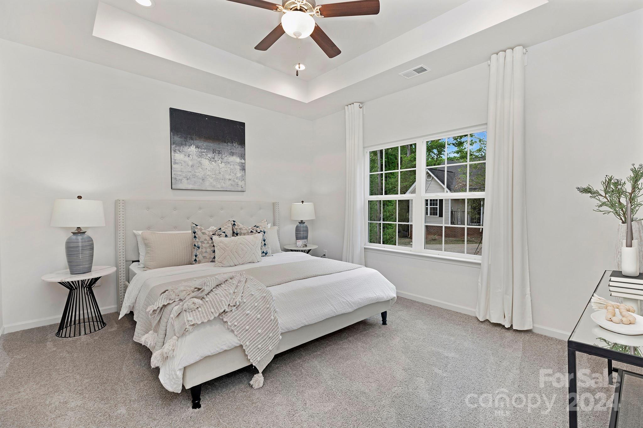 2150 Sunset Boulevard Charlotte, NC 28269 - Photo 12 of 23 a bedroom with a bed and a window