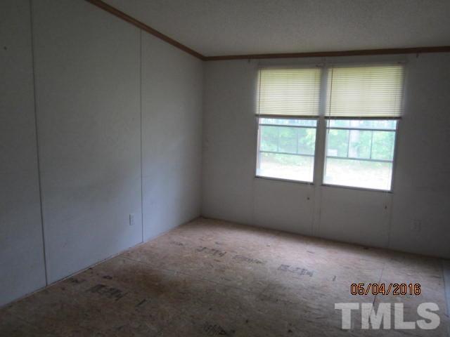 1492 Glenn Fogleman Road Rougemont, NC 27572 - Photo 20 of 24 an empty room with a window