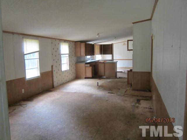 1492 Glenn Fogleman Road Rougemont, NC 27572 - Photo 10 of 24 a living room with furniture and a window
