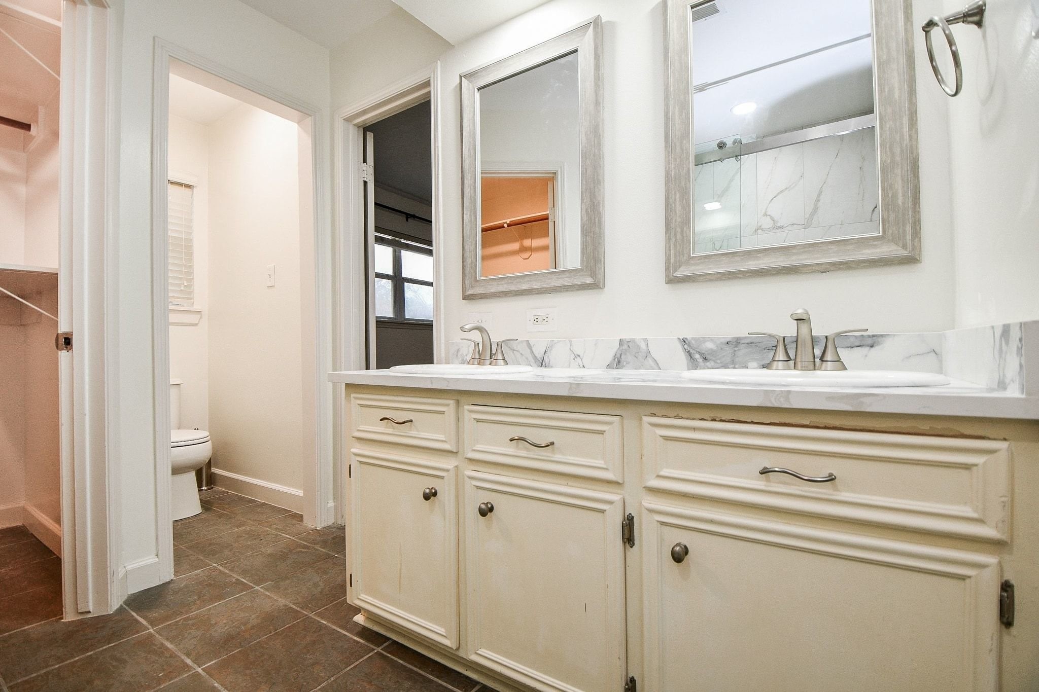14011 Wickersham Lane Houston, TX 77077 - Photo 22 of 38 Freshly remodeled, ensuite primary bathroom.