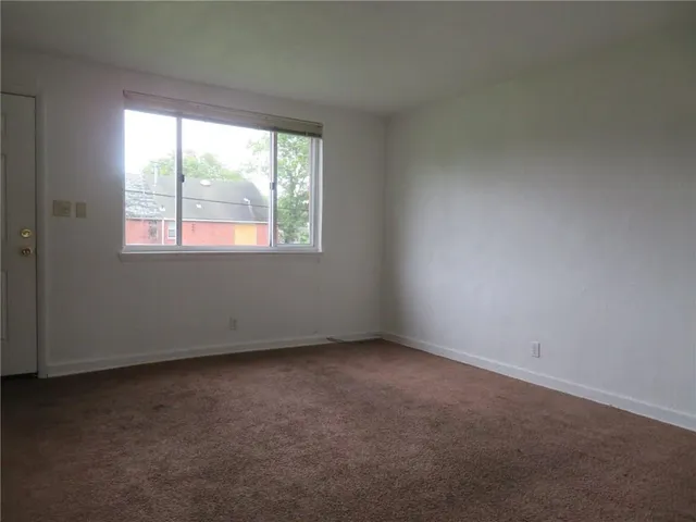 an empty room with a window