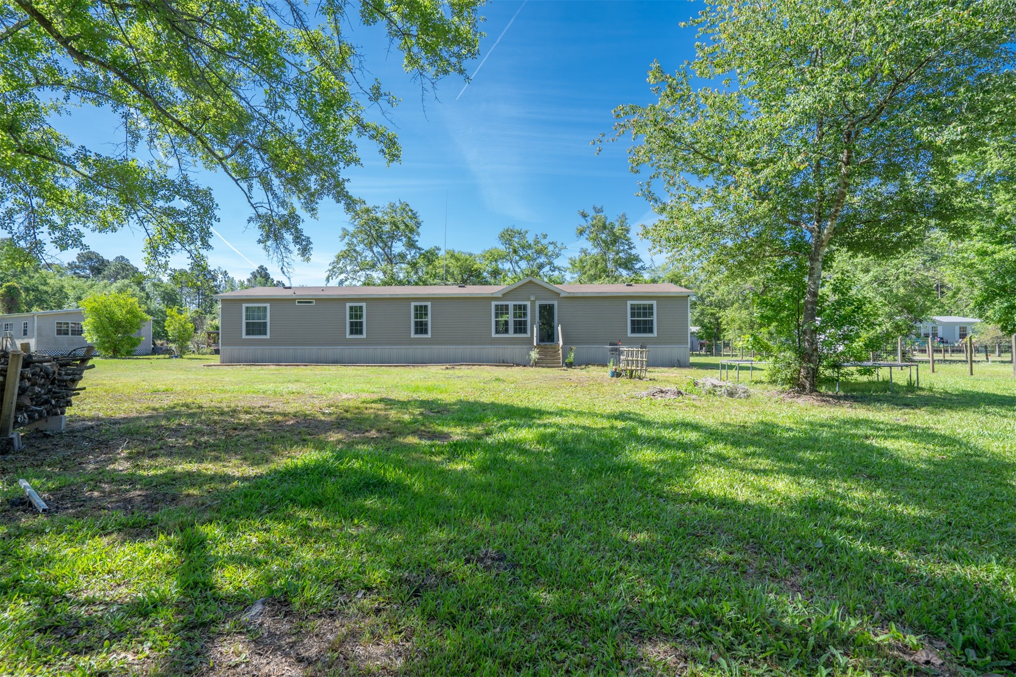 76220 Dove Road Yulee, FL 32097 - Photo 8 of 48 a view of a house with a house and a yard