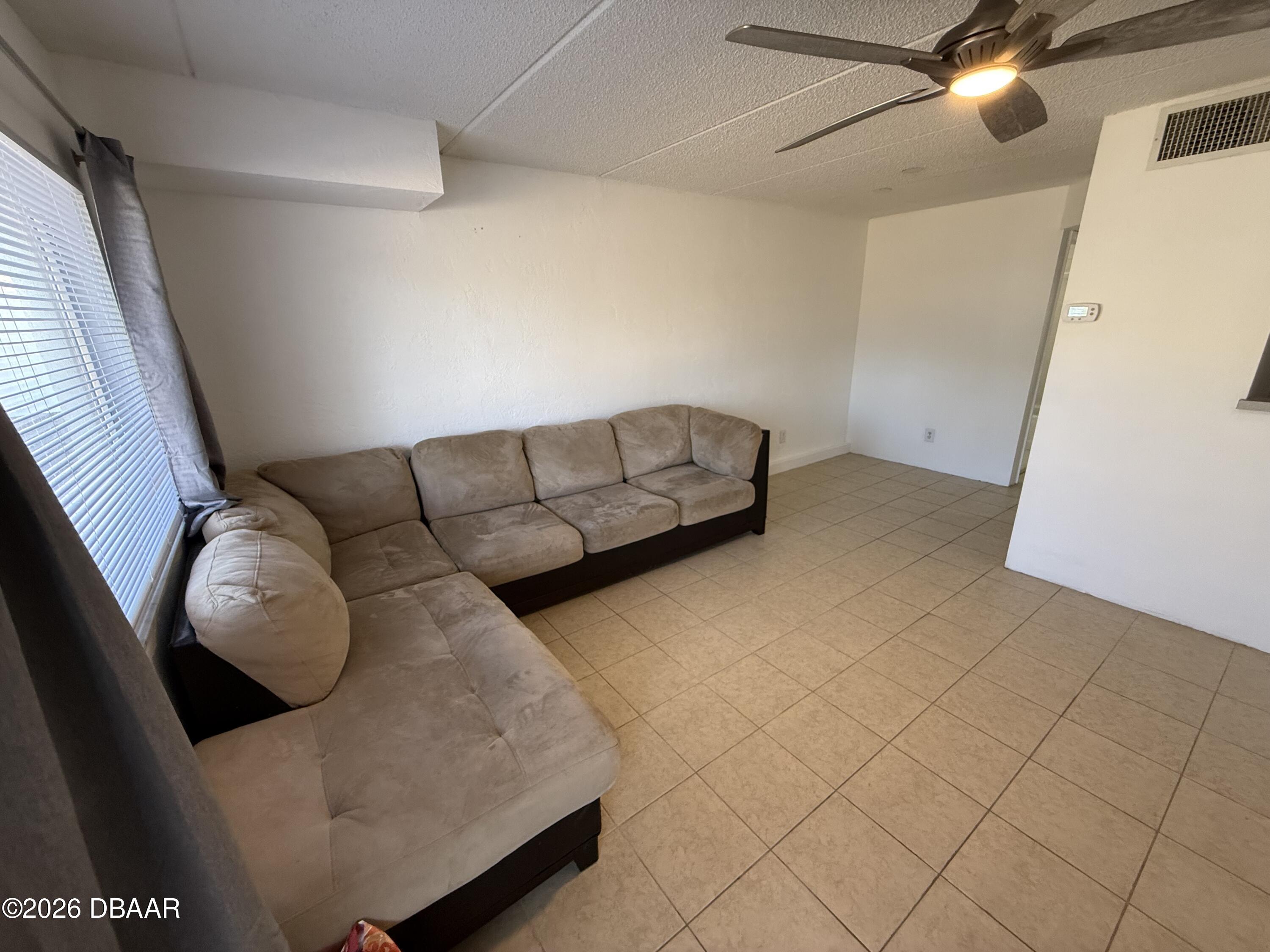 60 Vining Court, Unit 4 Ormond Beach, FL 32176 - Photo 3 of 9 IMG_7896