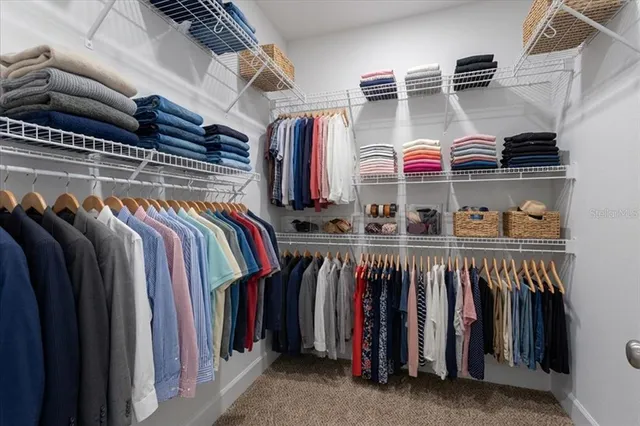 a view of a room with racks on the wall