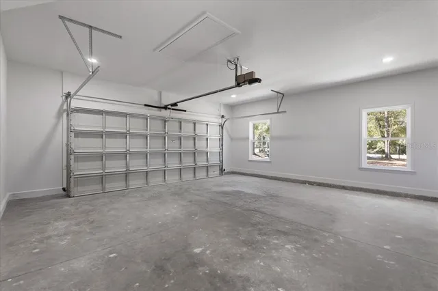 an aerial view of residential houses with city view